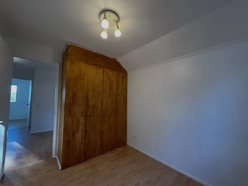 Dormitorio con clóset de Casa Villa Santa Carolina