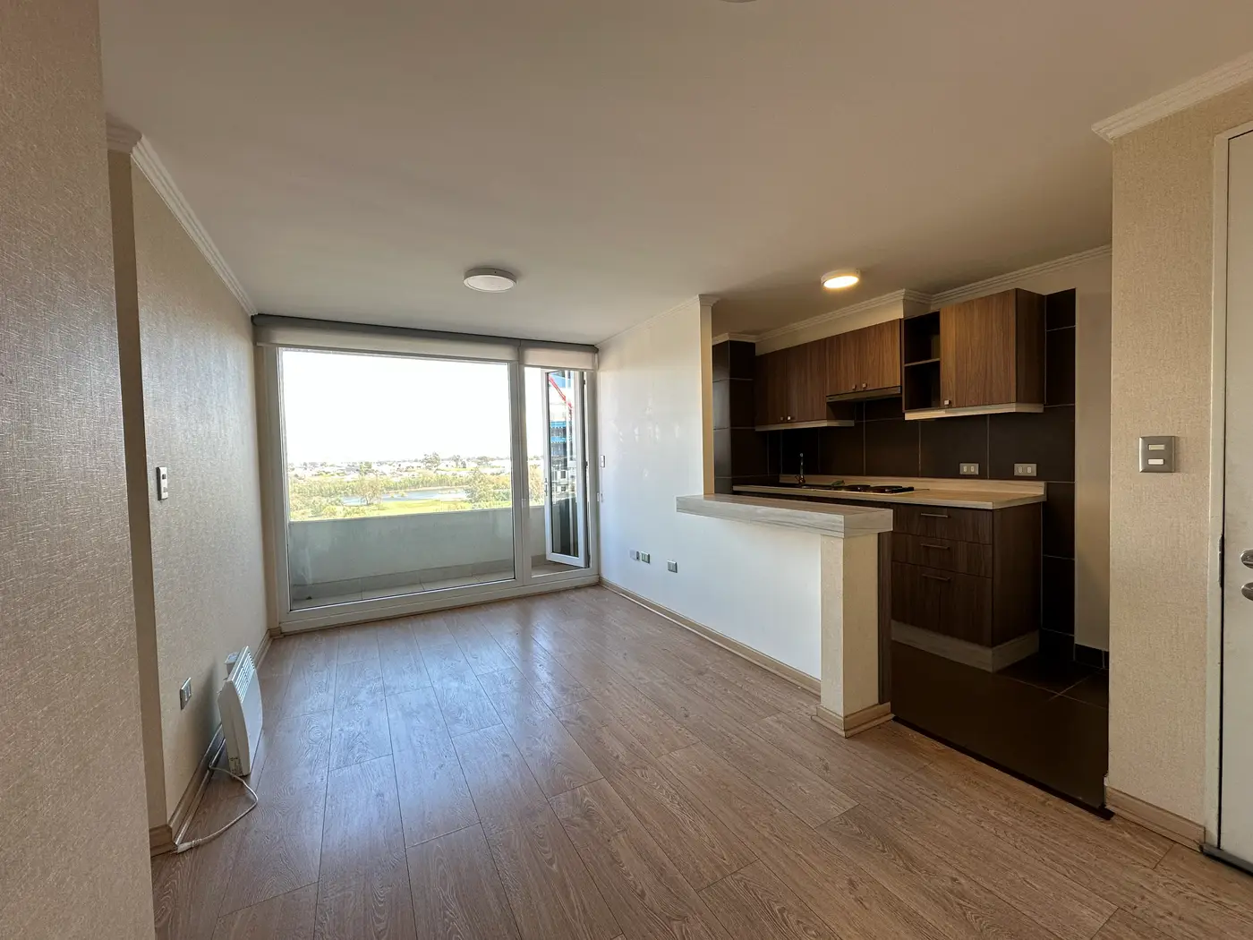 Living-comedor del departamento 3D en arriendo en Condominio Plaza Parque Los Poetas, Temuco