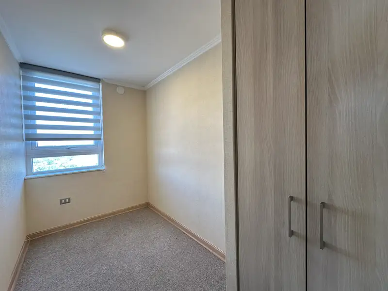 Dormitorio con clóset empotrado del departamento en Plaza Parque Los Poetas, Temuco