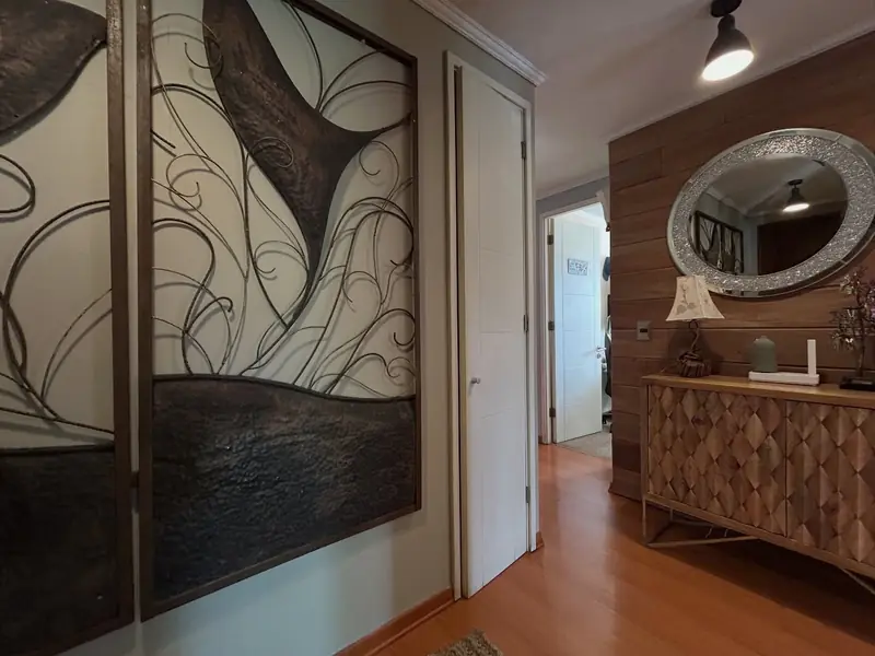 Hall de acceso del departamento Alto Boulevard, Temuco