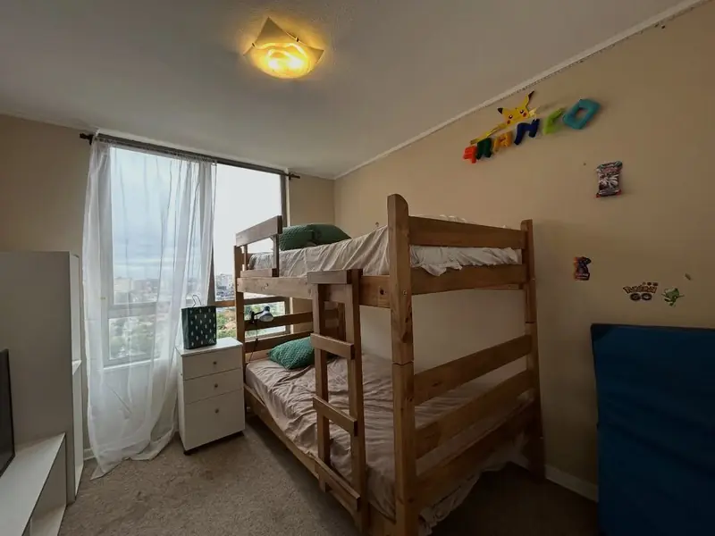 Segundo dormitorio del departamento Jardín de los Reyes