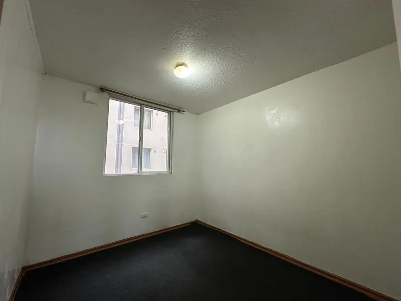Segundo dormitorio del departamento en Condominio Nueva Estación, Temuco