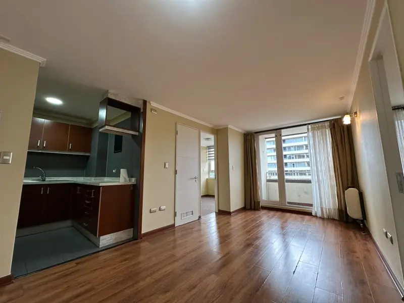 Living-comedor y cocina integrada del departamento Torre Quattro