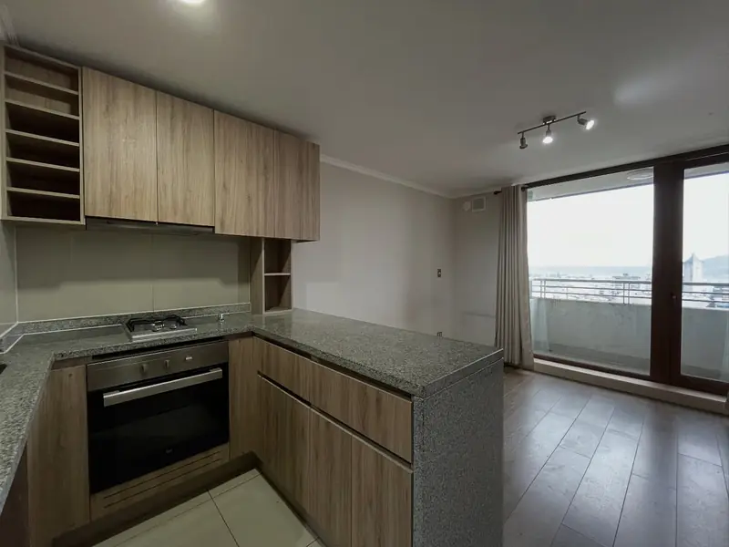 Cocina integrada del studio Edificio Doña Carmen